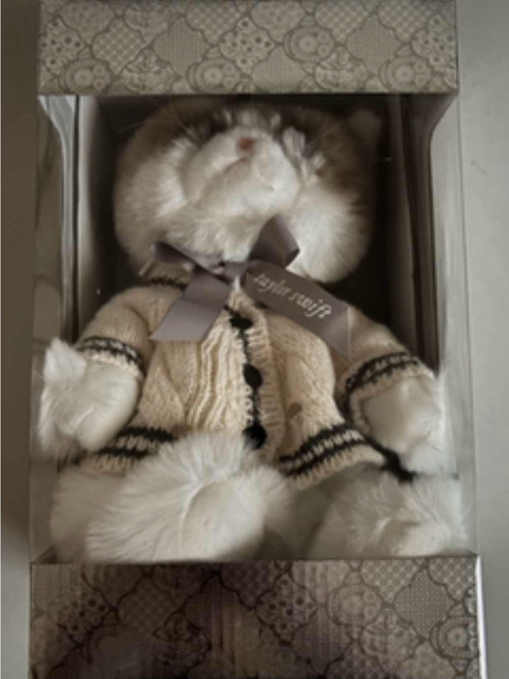 Taylor Swift Cream Plush Cat with Black Trim and Branded Ribbon
